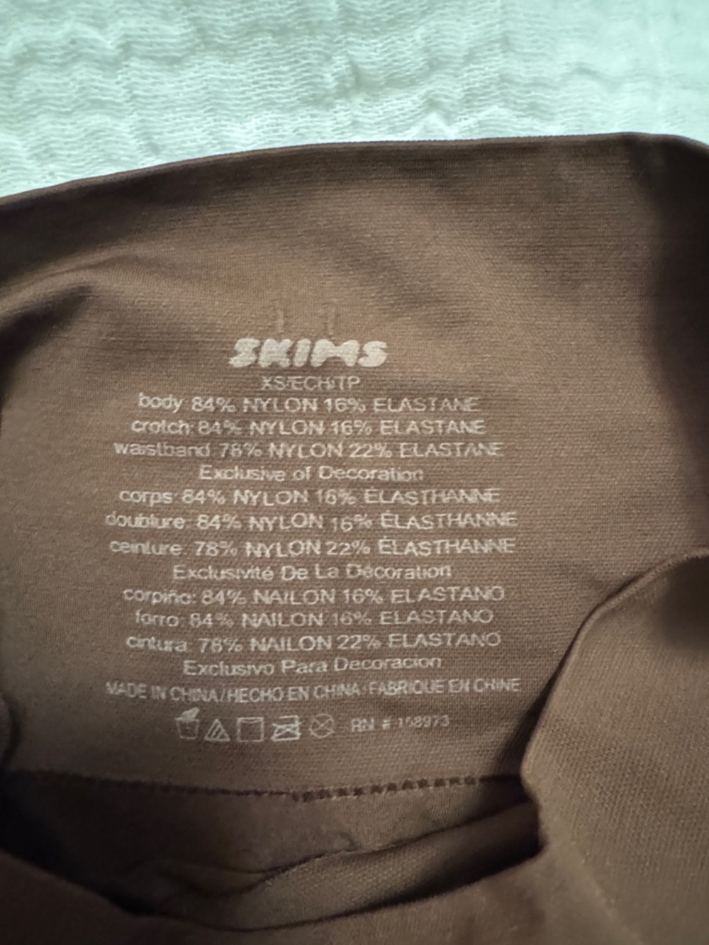 SKIMS High Waisted Shorts (Shapewear) in Cocoa - Picture 3 of 8
